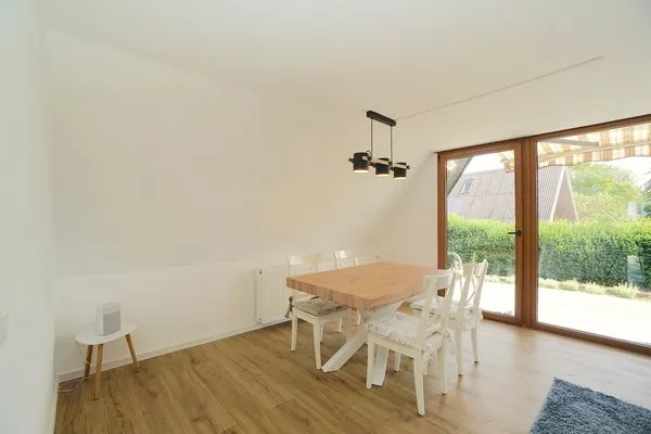 Wohnzimmer  Modernes Nurdachhaus in ruhiger Feriensiedlung direkt am Wittensee mit Seeblick