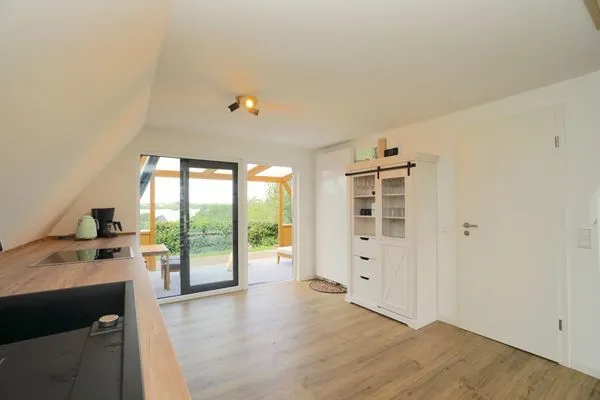 Küche / Küchenzeile  Modernes Nurdachhaus in ruhiger Feriensiedlung direkt am Wittensee mit Seeblick