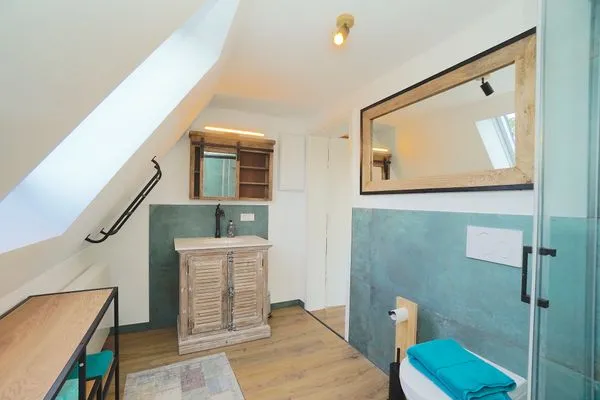 Badezimmer  Modernes Nurdachhaus in ruhiger Feriensiedlung direkt am Wittensee mit Seeblick