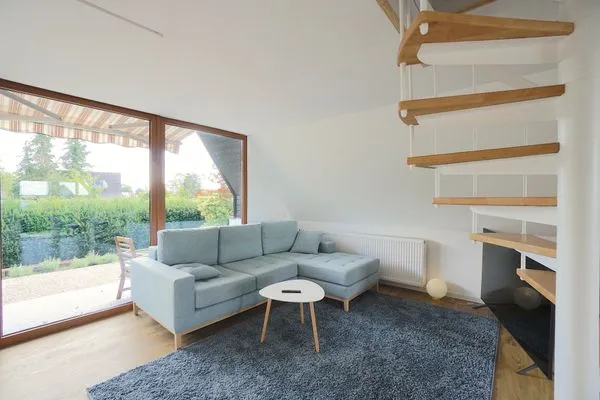 Wohnzimmer  Modernes Nurdachhaus in ruhiger Feriensiedlung direkt am Wittensee mit Seeblick