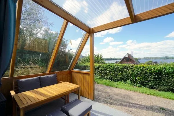 Terrasse  Modernes Nurdachhaus in ruhiger Feriensiedlung direkt am Wittensee mit Seeblick