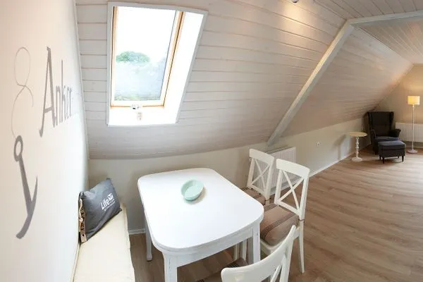 Wohnzimmer  Ferienwohnung Ankerplatz mit SPIELSCHEUNE am Wittensee