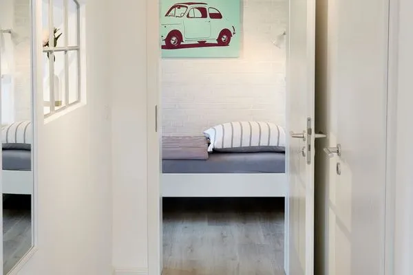 Schlafzimmer  Ferienwohnung Seegras - mit SPIELSCHEUNE, direkt am Wittensee