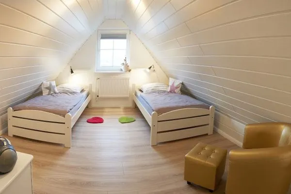 Schlafzimmer  Ferienwohnung Wasserspiel am Wittensee - mit SPIELSCHEUNE