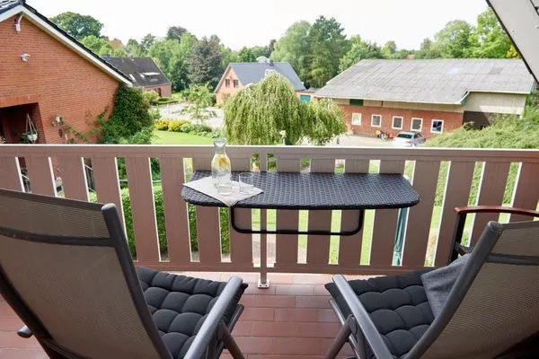 Terrasse  Ferienwohnung Wasserspiel am Wittensee - mit SPIELSCHEUNE