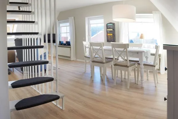 Wohnzimmer  Ferienwohnung Wasserspiel am Wittensee - mit SPIELSCHEUNE