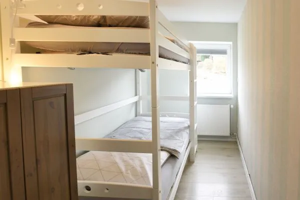 Schlafzimmer  Ferienwohnung Waterkant direkt am Wittensee, mit SPIELSCHEUNE