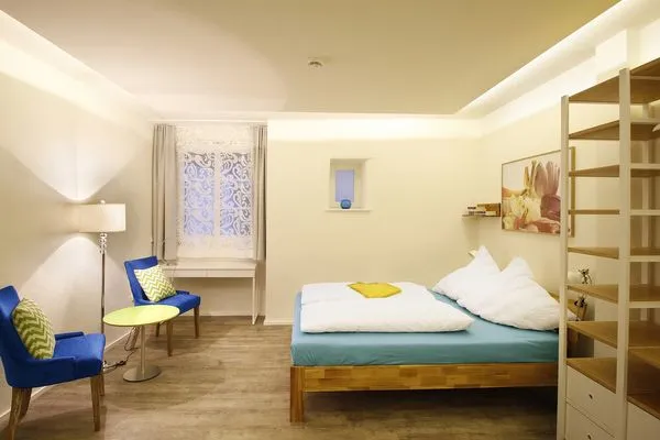 Multi-Fewo-Haus Zitronengässle 1 Ferienwohnung Mudita Lindau Insel - Schlafzimmer 2 - Doppelbett