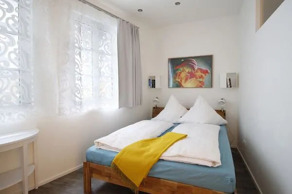 Multi-Fewo-Haus Zitronengässle 1 Ferienwohnung Mudita Lindau Insel - Schlafzimmer 2 - Doppelbett