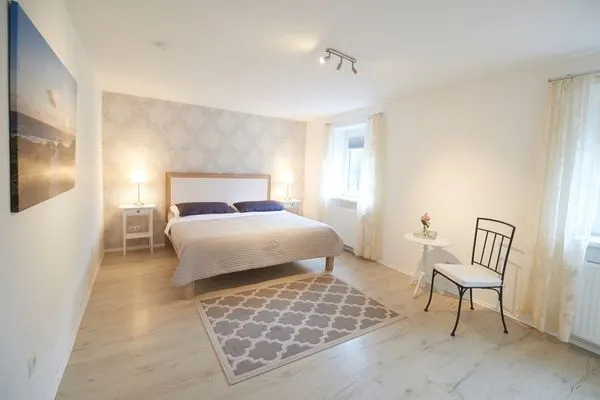 Schlafzimmer  Ferienwohnung Waterkant direkt am Wittensee, mit SPIELSCHEUNE