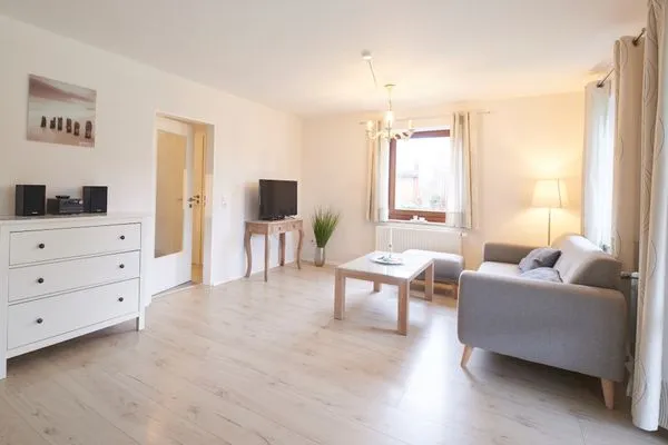 Wohnzimmer  Ferienwohnung Waterkant direkt am Wittensee, mit SPIELSCHEUNE