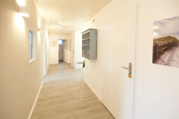 Fassade / Eingang  Ferienwohnung Brise 5, mit SPIELSCHEUNE direkt am Wittensee