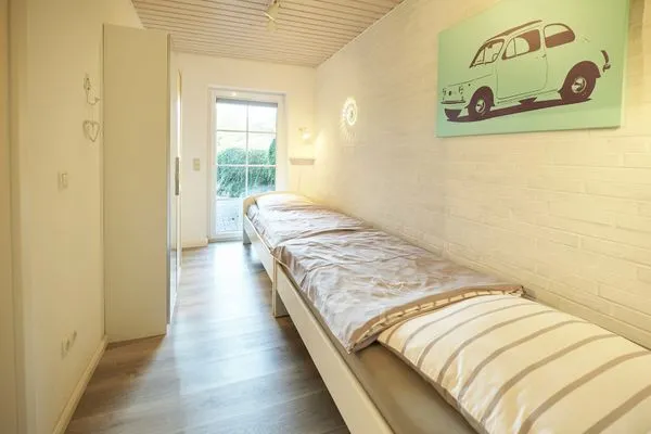 Schlafzimmer  Ferienwohnung Seegras - mit SPIELSCHEUNE, direkt am Wittensee