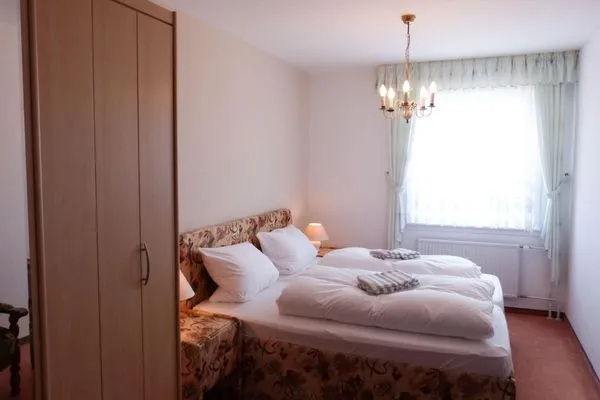 Schlafzimmer Haus Nordenlicht Ferienwohnung „Naujokat"