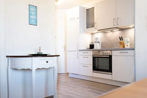 Küchenzeile mit Backofen und Geschirrspüler  Ferienwohnung "Mühlenteich App. 14"