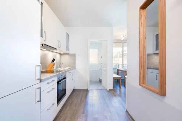 Küchenzeile mit Backofen und Geschirrspüler  Ferienwohnung "Mühlenteich App. 14"