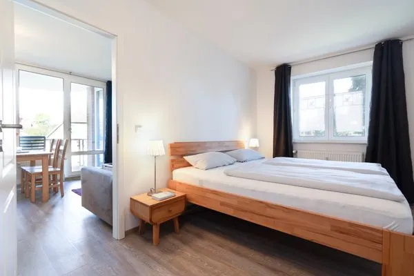 Schlafzimmer mit Doppel-Bett  Ferienwohnung "Mühlenteich App. 14"