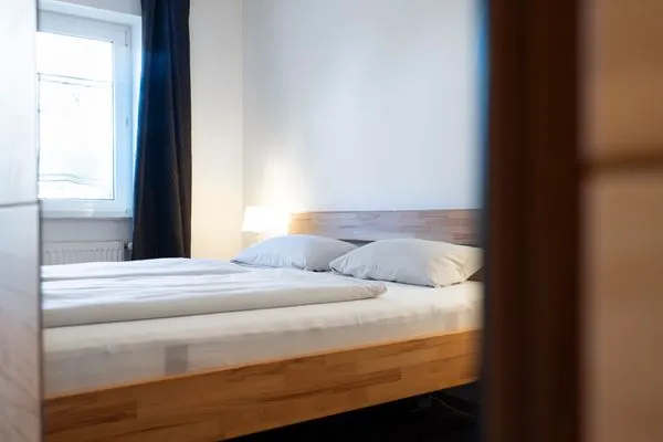 Schlafzimmer mit Doppel-Bett  Ferienwohnung "Mühlenteich App. 14"