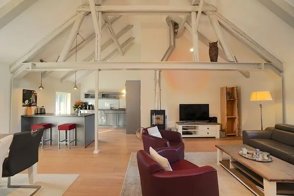 Wohnzimmer  Ferienwohnung Am Apfelbaum - romantische Remise direkt am Golfplatz und der Schlei