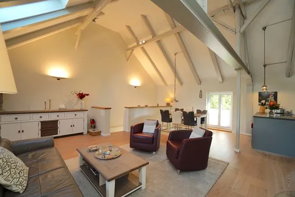 Wohnzimmer  Ferienwohnung Am Apfelbaum - romantische Remise direkt am Golfplatz und der Schlei