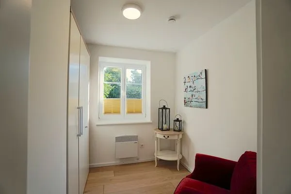 Gartenblick  Ferienwohnung Am Apfelbaum - romantische Remise direkt am Golfplatz und der Schlei