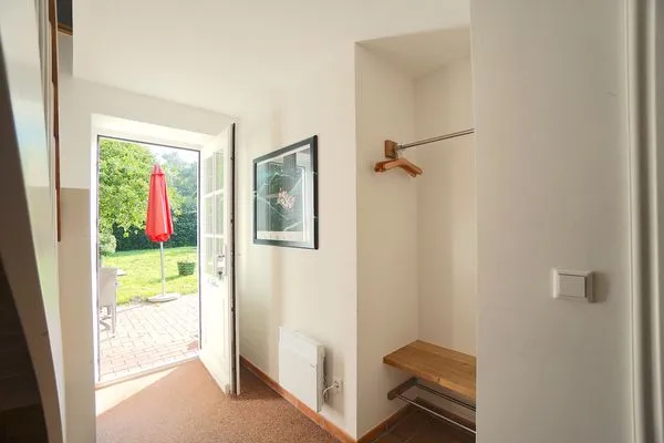 Fassade / Eingang  Ferienwohnung Am Apfelbaum - romantische Remise direkt am Golfplatz und der Schlei