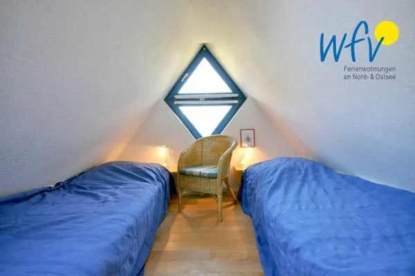 Schlafzimmer Ferienhaus Friesenblick Ferienwohnung 2