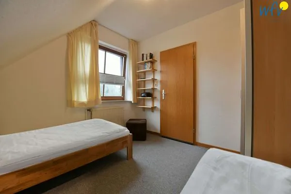 Schlafzimmer Kleine Pinkenburg Ferienwohnung Nord