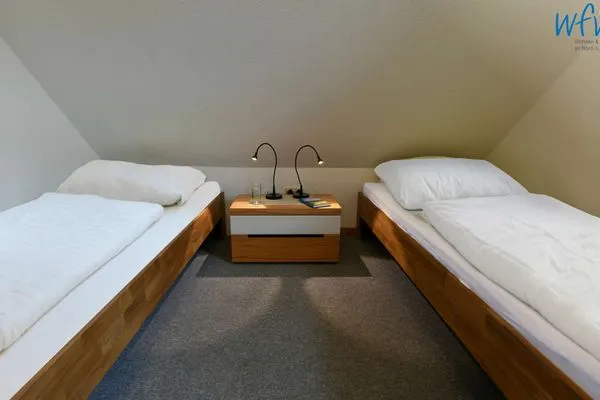 Schlafzimmer Kleine Pinkenburg Ferienwohnung Nord