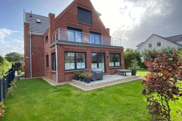 Hauptansicht Haus im Dorfgroden 14 Ferienwohnung Muschelsucher