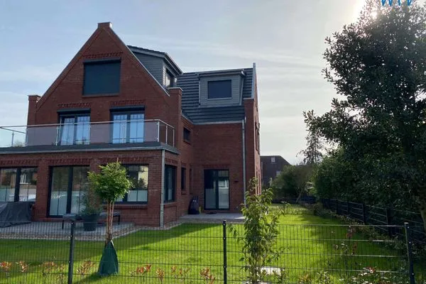 Hauptansicht Haus im Dorfgroden 14 Ferienwohnung Muschelsucher