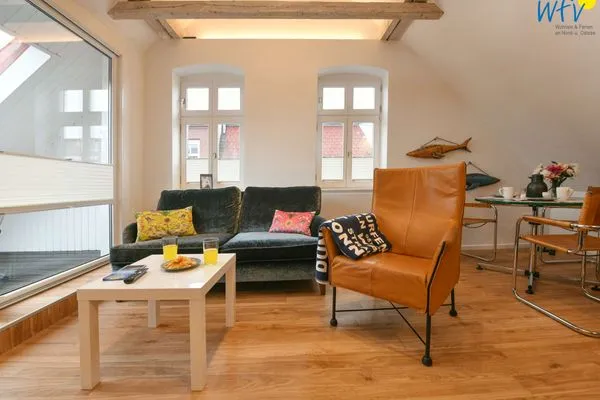 Wohnzimmer Logirhaus Doyen Ferienwohnung 9