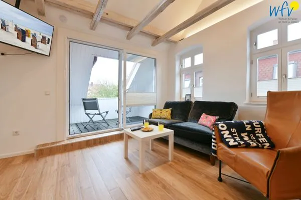 Wohnzimmer Logirhaus Doyen Ferienwohnung 9