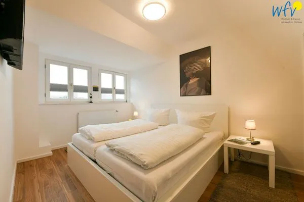 Schlafzimmer Logirhaus Doyen Ferienwohnung 9