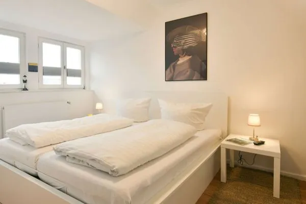 Schlafzimmer Logirhaus Doyen Ferienwohnung 9