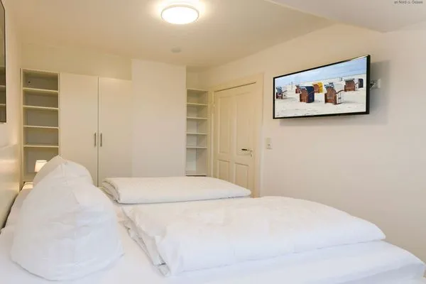 Schlafzimmer Logirhaus Doyen Ferienwohnung 9