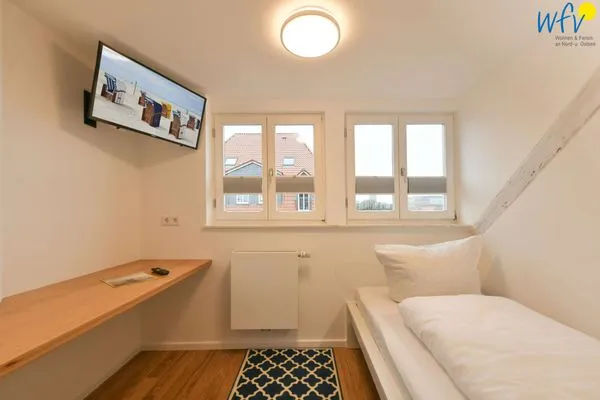 Schlafzimmer Logirhaus Doyen Ferienwohnung 9