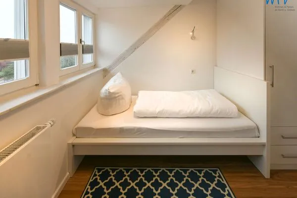 Schlafzimmer Logirhaus Doyen Ferienwohnung 9