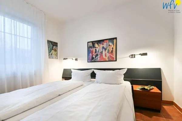 Schlafzimmer Luv und Lee Ferienwohnung Pilsum