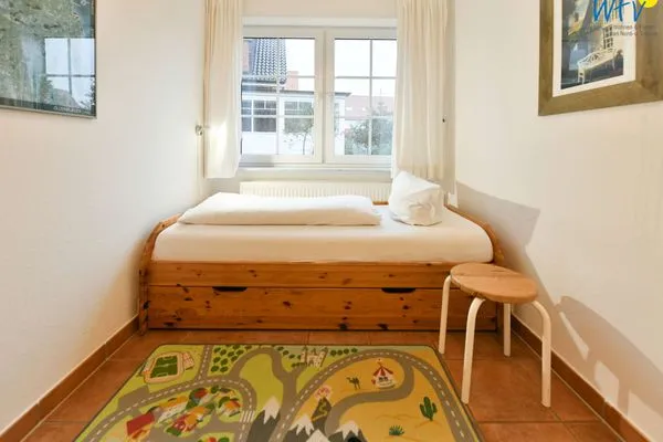 Schlafzimmer Luv und Lee Ferienwohnung Pilsum