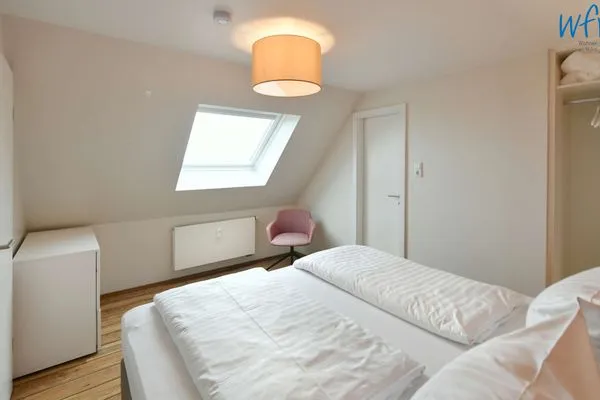 Schlafzimmer Uns to Hus Ferienwohnung Sünnupgang