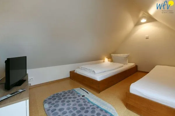 Schlafzimmer Uns to Hus Ferienwohnung Sünnupgang