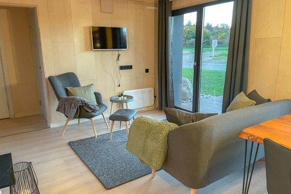  Ferienhaus Nordic Thor Belauer See - Wohnzimmer
