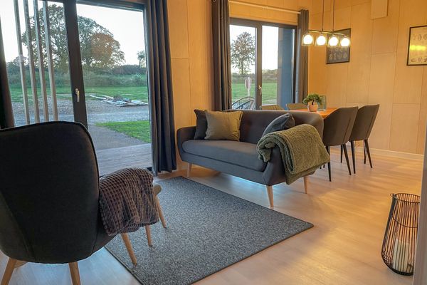  Ferienhaus Nordic Thor Belauer See - Wohnzimmer