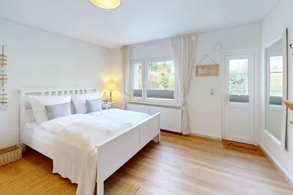 Schlafzimmer Küstenplatz Sandkorn - mit zwei Sonnenterrassen