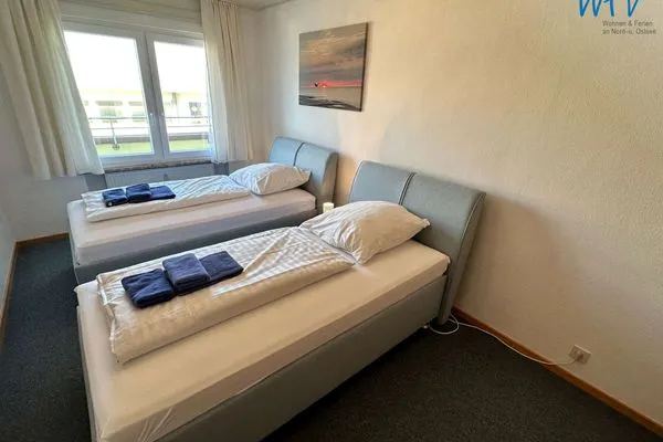 Schlafzimmer als Einzelbetten Dünenschlösschen Ferienwohnung 34