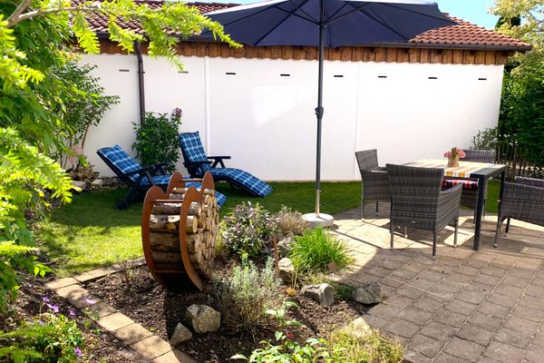  Ferienwohnung Alpina - Ferien mit Herz Ferienwohnungen in Roßhaupten - Gartenblick