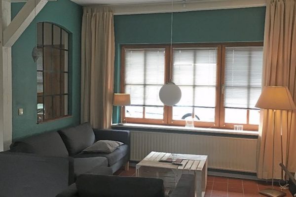  Lüttje Ferienhuus Tönning - Wohnzimmer