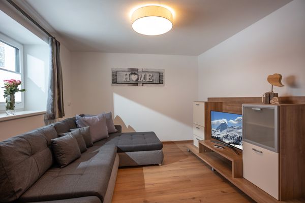  Am Brummelbach Appartement mit 2 Schlafzimmern - by NV-Appartements Westendorf - Wohnzimmer