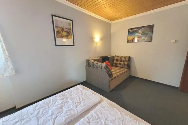 Schlafzimmer  Apartment Almkogel by FiS - Fun in Styria